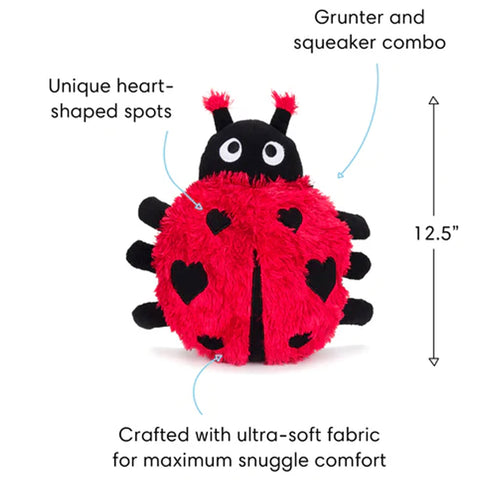 Red ladybug dog plush toy with black spots, grunter and squeaker combo, ultra-soft fabric, and dimensions on a white background.
