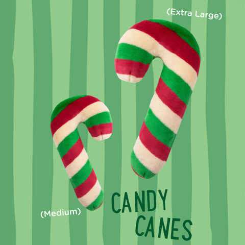Two candy cane-shaped plush toys, one medium and one extra large, on a green striped background with 'CANDY CANES' text.
