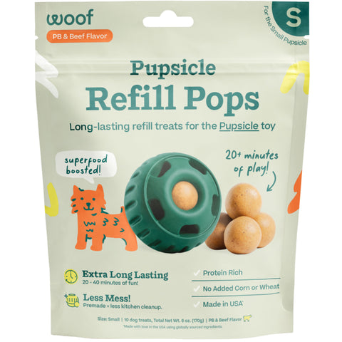 Packs of Pupsicle Refill Pops for a dog toy with text and graphics on packaging.