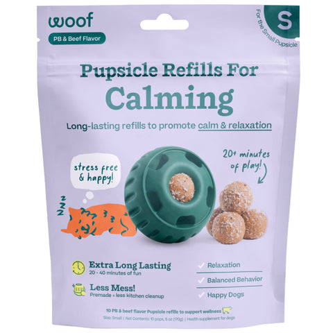 Package of Pupsicle Refills for Calming with a green toy and brown treats on a purple background